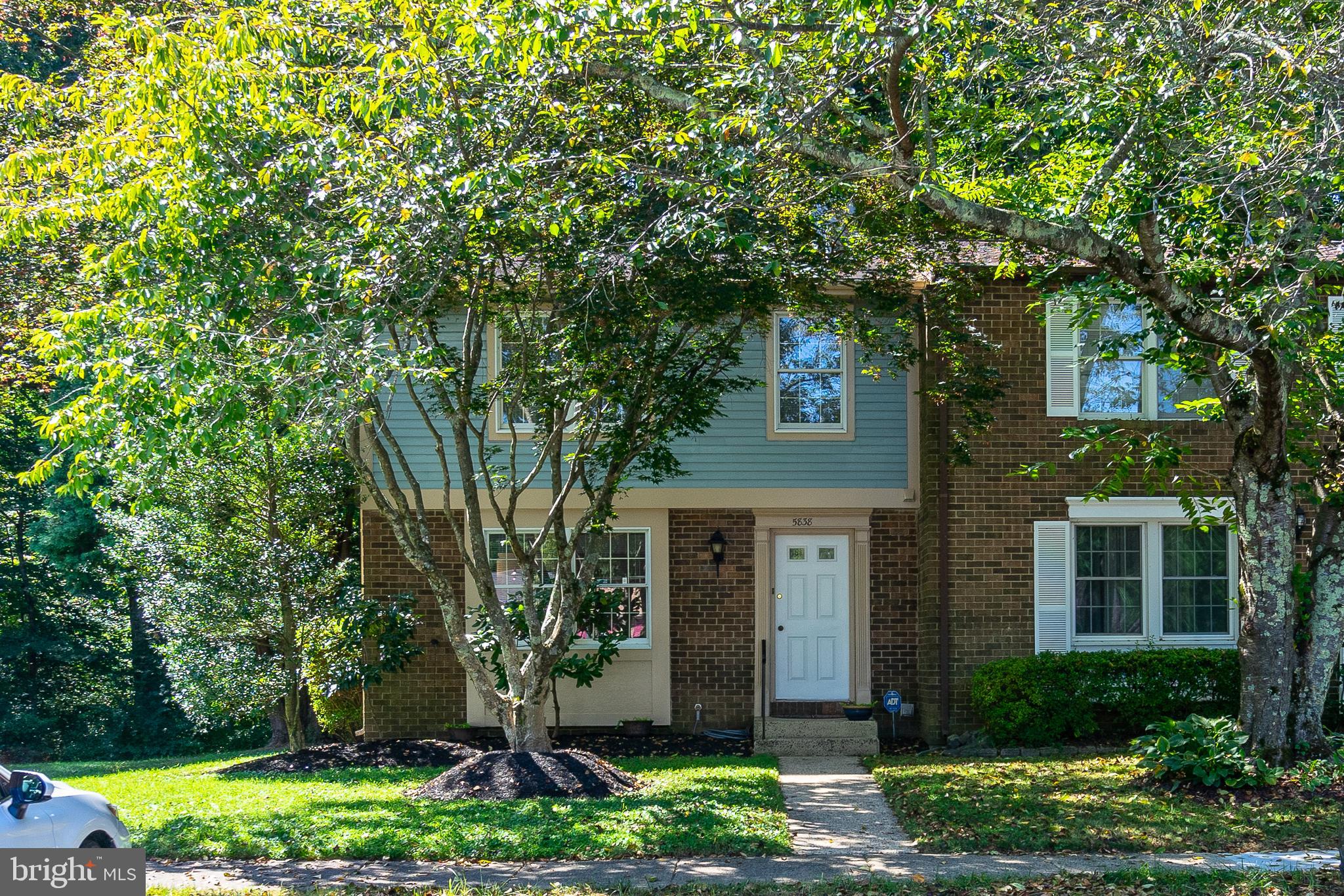 Beautifully well maintained end unit town house in the heart of Burke Virginia. This 3 level home is in great condition boasting hardwood floors on the main level with open space throughout the level. Home offers a finished basement with a half bath along with a separate area for laundry. Third floor provides spacious three bedrooms and two full baths. This is end unit has great landscaping on the front and side leading to a beautiful brick patio in the backyard.