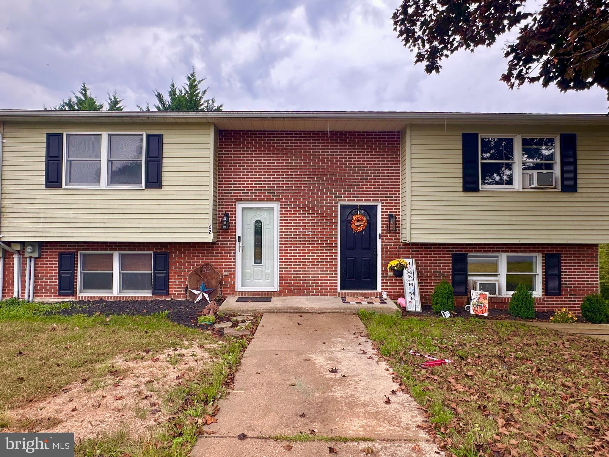 This well-maintained, remodeled 3-story split level townhome could be perfect for what you are seeking. Located in the Kensington Heights neighborhood offers many conveniences. This home offers 3 bedrooms and a full bath on the upper level with a living room, dining room, kitchen and half bath on the main level and a family room, utility/storage/laundry room on the walk-out level basement. Many updates including new plumbing, flooring, paint, stainless steel kitchen appliances etc. The rear yard is fully fenced giving way to the perfect location for pets and family. Price has been drastically adjusted and is now ready for serious buyers which may be you!