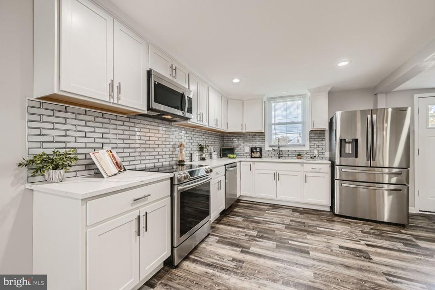 *** BACK IN THE MARKET FOR THE SECOND TIME DUE TO BUYERS NOT BEING ABLE TO GET FINANCING OR FAILING TO PERFORMED.  INSPECTION REPORT AVAILABLE PER REQUEST***
A beautifully renovated 4BR/1.5BA expanded cottage on an oversized lot in Overlea. Open the door and step into your forever home beaming with an abundance of natural light and that open concept floor plan homeowners are craving.  Walk through the spacious living room into a magnificent living space consisting of an open floor plan with a family room, a breakfast room, a spectacular kitchen, and dining room.  The kitchen boasts shaker cabinets, granite countertops, glass tile backsplash, and a large stainless sink under a window.  Off the kitchen is a mud room with access to the driveway and spacious yard.  Two primary sized bedrooms, a sizable third bedroom, a full bath, and a half bath complete this main floor living space.  An upstairs bonus room is ideal as a fourth bedroom, office, or play area. From the kitchen step outside onto a newly constructed deck overlooking the vast green space in need of some TLC, imagine the possibilities.  This home is move-in ready with a freshly painted interior, luxury flooring, new carpeting, recessed lighting, and so much more.  Imagine all this and in close proximity to shopping, restaurants, and commuter routes.