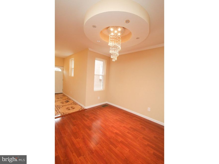 WOW! Look no further, good things come to those who wait! Unbelievable West Oak Lane Home Completely Knocked Out, ready for you to move into! Do you like elegance? Well this home is one of a kind and offers every extra a buyer can want. The entire home has new windows, a new roof w/ warranty, all new siding, updated electric & plumbing, and not to mention all new efficient Heating & AC Units! The 1st floor features a huge open layout with Brazilian Cherry floors, and a unique trey ceiling combo with recessed lighting & a Waterfall Chandelier! There is a brand new designer kitchen, which features GE appliances, Granite Counters, S/S Appliances & breakfast area! The first floor also includes a tiled powder room & a deck off the rear perfect for entertaining! The upstairs features 3 huge bed rooms, and a state of the art spa bath with a Corner Jacuzzi. Other key features include a completely tiled powder room and a full finished walk-out basement for your convenience. This home truly has it ALL and is a MUST SEE!