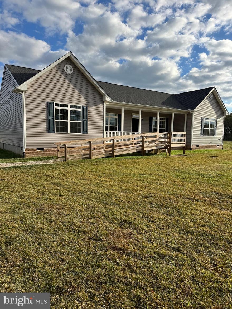 Welcome to your own private retreat. This exceptional property is made up of four separate abutting parcels, sold together, for a total of approximately 83+ acres.  The house, double car port and HUGE Barn/Workshop are situated on 10.673 acres (56-10-4). Abutting this is 42.347 acres (56-10-3)--2/3 treed with a stream in the back and the balance cleared.  22.7 acres to the right of the house  (56-10-2) is gentle in topography and nearly all cultivated with a visible tree line in the distance.  The 7.64 acres (56-10-1) is at the front and right of the property.  It has additional road frontage on Horseshoe Farm Rd. While the parcels are currently "The Farm", being separate, they offer so much possibility — with potential for additional home sites, a family subdivision, horses, or other uses, subject to county approval. 

The sprawling one-level rambler is perfectly situated surrounded by this beautiful countryside. Designed for comfort and function, this home features a split-bedroom floor plan with 4 spacious bedrooms, 2 full baths, and 9-foot ceilings throughout. Wide doorways and open spaces make for easy living, while the thoughtful layout blends modern convenience with country charm.

Step inside to find fresh carpeting, recessed lighting, and transom windows that fill the home with natural light. The center-island kitchen is a cook’s delight, featuring gas cooking, stainless steel appliances, a large farm sink, and a generous pantry. Enjoy quiet mornings on the front porch, or unwind in the evenings on the screened back porch, surrounded by peaceful views of your land.

Additional features include a tankless water heater, Generac generator (powering the home, barn, and former greenhouses), and a detached carport for added convenience.

The property’s impressive pole barn or shop is fully equipped with its own electrical sub-panel, commercial stainless sink, and durable hardware — ideal for farm operations, equipment storage, or creative projects. Formerly home to three greenhouses, the site still has heat and water lines in place, ready to be reactivated if you wish to restore or expand agricultural production.

Enjoy the tranquility of a quiet, rural setting with the flexibility and infrastructure for your next venture — whether that’s farming, gardening, homesteading, or simply savoring the wide-open space and fresh country air.

With a convenient location approximately 6 miles from I-64, a stones throw to the heart of Louisa and just around the corner from Lake Anna, this is an amazing spot-on location.