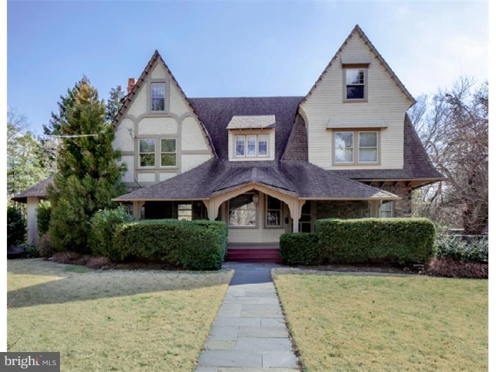 This c.1894 5-6 BD, 3.5 BA home is highlighted by a fabulous Great Room with vaulted ceiling, curved walls, huge brick fireplace, and built-in bookshelves & benches. Symbols of musical instruments were embedded in the leaded glass windows for the former symphony-director owner who used this room for recitals. This property also offers a rare opportunity in sought-after South Wayne for a home AND carriage house with a separate 2-story in-law apartment. An inviting covered front porch and rear flagstone patio overlook the level yard, which is embraced by a privacy hedge. The charming Carriage House apt. features a dramatic Living Room with a soaring beamed ceiling, updated Kitchen, W/D, and 2 BD, 1 BA upstairs. In addition to the unique Great Room, the 1st fl. of the main house also has a Parlor with diamond-pane windows, Living Room with original fireplace & leaded glass windows, Dining Room with leaded glass windows, Butler's Pantry, Kitchen, Breakfast Room, & Powder Room. The 2nd fl. features a Master Suite with large Master Bathroom, Laundry Room, 3 more Bedrooms and a Hall Bath. The 3rd fl. was renovated by the current owners and has a 5th Bedroom, 3rd full Bath, & a large Bonus Room currently used as an exercise & recreation room (could be 6th Bedroom.) This well-maintained home has original hand-carved millwork, wood floors, neutral paint & carpet, and is updated with multi-zone gas heat and central A/C. Covered parking for 2 cars is available in the over-sized Carriage House. Sited on a quiet corner, this Radnor Twp. property is within easy walking distance of the shops, train, & restaurants in downtown Wayne, but is not adjacent to commercial properties or affected by school & church traffic. Designed by Wm. Lightfoot Price and built by Wendell & Smith, this property is rich in history and offers easy access to parks, schools, Center City, and the Airport. Public Open House Sun. March 23 from 2-4.