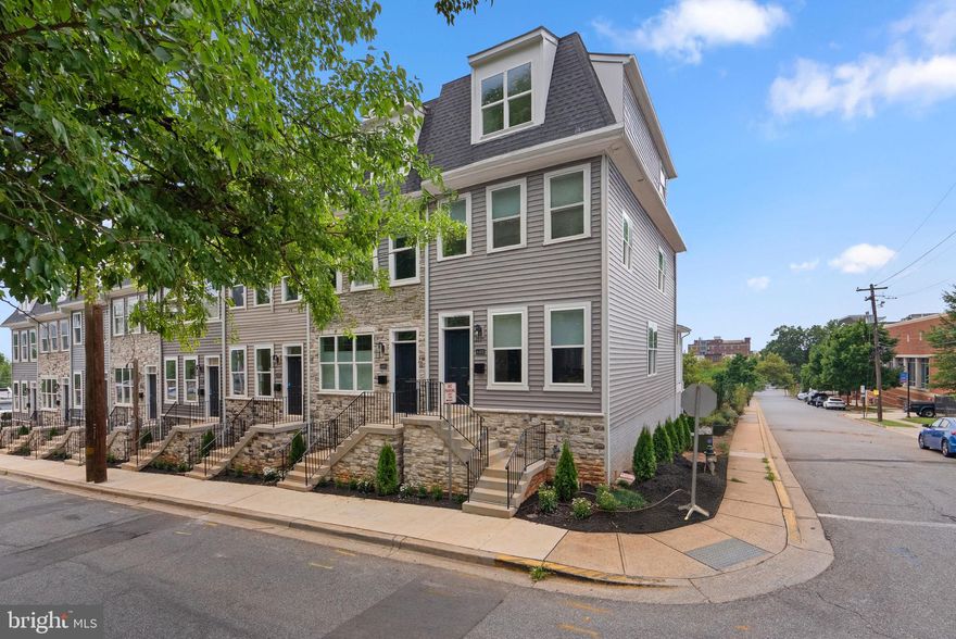 Welcome home to Hyatt View, where RBC Builders is raising the bar for townhome living with its stunning new-construction 4-level contemporary style homes. Located in the heart of the Hyattsville Arts District along the Route 1 corridor, these luxurious townhomes reach new heights. Here you will discover a traditional neighborhood ambiance enriched by the dynamic spirit of the already bustling Hyattsville area. These meticulously crafted homes boast a unique architectural design adorned with contemporary finishes that harmonize with the classic elements that define this charming historic locale.
Step into any of the eight exceptional townhomes and you notice that they encompass sophistication and comfort. The main level gourmet kitchen is truly the heart of the home and is perfect for everyday dining or casual gatherings. With an open floor plan and 9 ft. ceilings, this level also includes a wonderful, light-filled living/dining area that leads to a large deck off the rear, providing a perfect outdoor retreat for entertaining or relaxation. 
Your personal sanctuary awaits on the upper-level primary bedroom suite, complete with a generous walk-in closet and a lavish bathroom featuring double sinks and a floor-to-ceiling tiled glass-enclosed shower, offering a spa-like experience every day.  Also on this level is a second spacious bedroom with en-suite bath. Convenience is paramount with a thoughtfully located laundry area on this level. The second upper level has incredible views and features an additional bedroom, full bath and loft area flex space. 
The fully finished lower level adds extra living space, ideal for guests or as a recreational area and has convenient access to the one car garage and additional parking space under the deck.
Location is key at Hyatt View, with immediate access to Hyattsville's many shops and restaurants as well as public transportation. Just south you will find Riverdale Park Station with additional amenities, including a Whole Foods Market, Gold’s Gym, and an array of additional dining options. You will also enjoy the vibrant atmosphere at the nearby Farmers Market and Town Center Market. For outdoor enthusiasts, there is easy access to the trolley trail and multiple parks in the area.  These homes won't last!  Call listing agent for additional information.
Photos are of 4401 Oglethorpe (model home). Floor Plans are consistent but finishes may vary.