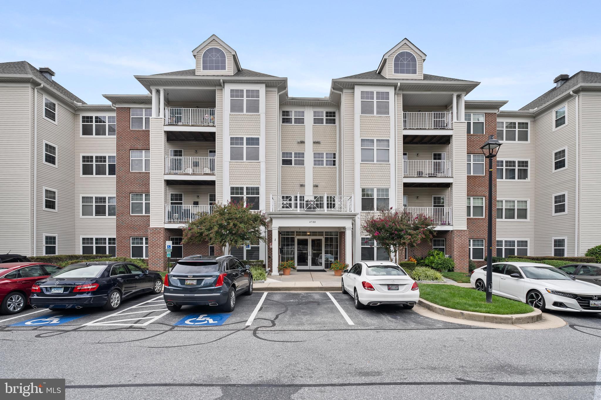 Welcome to 4500 Chaucer Way, Unit 202, a bright and inviting 2 bedroom, 2 bathroom condo in the heart of Owings Mills. This spacious home features an open layout with abundant natural light, a living room with a cozy gas fireplace, and a private balcony for morning coffee or unwinding after the day.
Step into the light-filled living-dining area, elegantly enhanced by built-in bookshelves and recessed lighting and plush carpet perfect for both quiet evenings and lively entertaining. Just off the living space, a versatile den with French doors invites you to use it as a home office or lounge. The open concept kitchen and family room features gleaming hardwood floors, a spacious island, and a walk in pantry.
Retreat to the master suite, a sanctuary complete with a generous walk-in closet, ensuite bath featuring a standing shower and soaking tub. A second bedroom and full hall bath offer ideal accommodations for guests or family.
Located near transit hubs, dining, and shopping including Foundry Row, Mill Station, and Metro Centre, this home offers both lifestyle and convenience in Owings Mills.