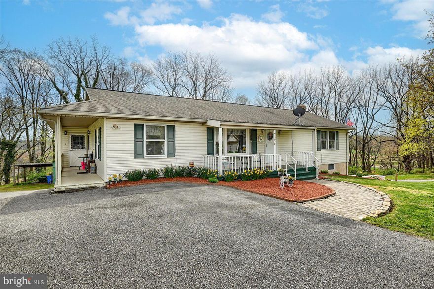 Welcome to this charming rancher nestled on 1.17 acres in Spring Grove Schools. This beautifully updated property offers a perfect blend of comfort and functionality, featuring 3 spacious bedrooms and 2 full bathrooms in the main home.   New flooring, fresh paint, and tastefully updated bathrooms that add a modern touch.
The heart of the home offers an open and inviting layout, ideal for everyday living and entertaining. Step outside to enjoy the expansive deck and large yard space, perfect for gardening, outdoor activities, or simply relaxing in your own private retreat.
In addition, this property boasts an attached in-law quarters with a separate entrance, offering 2 additional bedrooms, 1 full bath, and a convenient kitchenette — perfect for extended family or guests.
Completing this fantastic package is the new minisplit system throughout and a spacious 3-car garage, providing ample storage and workspace. This is a rare find — move-in ready, versatile, and situated on a generous lot with room to make it your own.