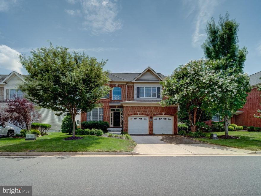 Stunning Colonial-Style IRVINE Model by Toll Brothers | Loudoun Valley Estates 2

Welcome to this exquisite north-facing single-family home in the prestigious Loudoun Valley Estates 2 community. Built by Toll Brothers, this Colonial-style IRVINE model offers over 4,625 square feet of luxurious living space across three beautifully designed levels.

Freshly painted and meticulously maintained, this move-in ready home features an open-concept layout with hardwood floors throughout the main and upper levels. Enter through a charming brick-covered front porch into a grand two-story foyer, highlighted by a striking chandelier that sets the stage for the home's elegant design.

The main level includes two inviting living spaces, a formal dining room, and a spacious family room with a gas fireplace. The gourmet kitchen is a chef’s dream, complete with cherry wood cabinetry, a stylish backsplash, granite countertops, stainless steel appliances, a two-door refrigerator, and a large center island—perfect for both everyday living and entertaining.

Enjoy the sun-filled morning room extension that flows effortlessly to a Trex deck, offering the perfect outdoor space to relax or host gatherings in your private backyard retreat.

The fully finished walkout basement features brand-new PVC flooring and a wet bar, creating a versatile space ideal for entertaining, recreation, or relaxation.

Upstairs, you’ll find four generously sized bedrooms, including a luxurious owner’s suite with a private sitting area, a large walk-in closet, and a renovated spa-like bathroom with a double vanity.

NEW ROOF IN 2024 AND NEW UPSTAIRS AC IN 2024, TESLA CHARGER IN GARAGE.  MICROWAVE/OVEN IN 2022, STOVE IN 2022, BASEMENT FLOOR UPDATED IN 2021
 
Located in a top-rated school district and just minutes from the Metro, shopping, dining, Dulles Airport, and Loudoun County Parkway, this home also provides access to the exceptional amenities of Loudoun Valley Estates.

Don't miss this rare opportunity to own a remarkable home in one of Loudoun’s most sought-after neighborhoods—schedule your private tour today!