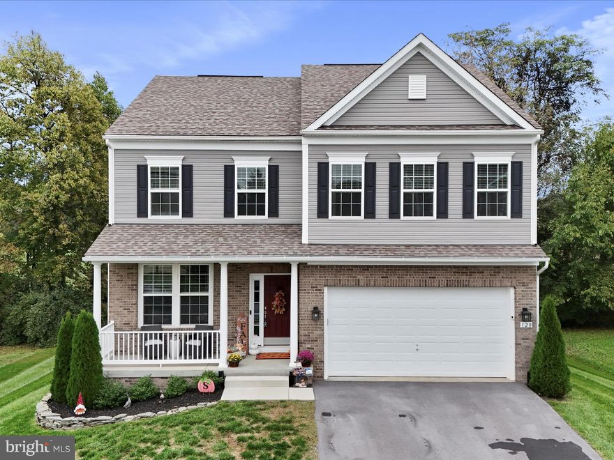 Why wait to build, move in ready!!!! Immaculately kept 4BR 3.5BA Colonial with 2 car garage. Main level features luxury plank vinyl throughout, spacious family room with electric fireplace; gourmet kitchen with expansive center island; formal living room and breakfast nook. Owners suite with walk in closet, separate shower/tub, dual sinks. Laundry on bedroom level. Fully finished lower level with luxury plank vinyl floors, storage room, office/den, recreation room and is walk out level to stone patio. Rear level deck.  Community Amenities features pool, community center, walking path, sidewalks. Home shows like a model, must see to appreciate!