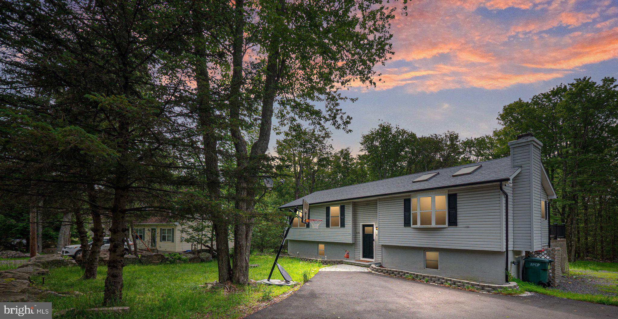 Charming 4-bedroom, 3-bath bi-level home nestled in the gated A Pocono Country Place community. Whether you're a first-time buyer or looking for a weekend escape, this well-maintained property is a perfect fit.
Beautifully remodeled with an additional bonus space on the lower level, this home offers flexibility for families, guests, or a home office. Enjoy a bright eat-in kitchen, a cozy living room, and a large family room downstairs—perfect for relaxing or entertaining.
Step out onto the deck and take in the peaceful surroundings of the spacious backyard. There's also plenty of room to make it your own with additional space in the basement.
Community amenities include: Multiple lakes with beach access, Outdoor pools, Tennis courts & playgrounds, 24-hour security in a gated setting and much more!
Located in Coolbaugh Township and within the Pocono Mountain School District, you're close to all the Pocono attractions—hiking, skiing, shopping, and more.