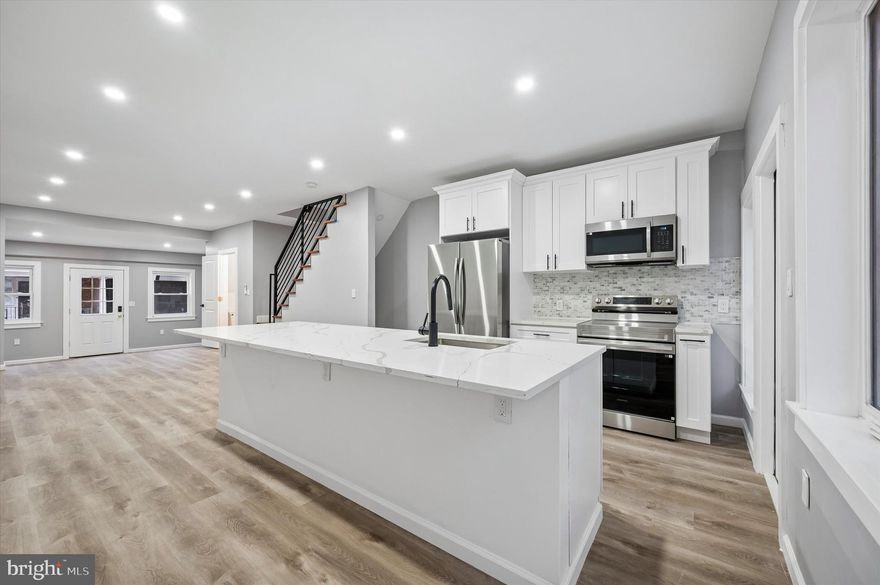 Welcome to 547 S Yewdall Street — a fully renovated, move-in ready home offering 1,515 square feet of well-designed living space. This 3-bedroom, 1.5-bath property features an open-concept main level with hardwood flooring, sleek iron railings, and a spacious kitchen anchored by an oversized island. A convenient first-floor powder room and direct access to a private rear outdoor area make the layout both functional and ideal for everyday living.

Upstairs, you’ll find three comfortable bedrooms and a modern full bathroom, easily accommodating a variety of living needs including guest space or a home office setup. The fully finished basement adds valuable additional living space—perfect for a media room, gym, or secondary lounge—and includes rear access to the outdoor area, a rare and practical feature.

A turnkey opportunity at an accessible price point—547 S Yewdall is ready for its next owner. Schedule your showing today.