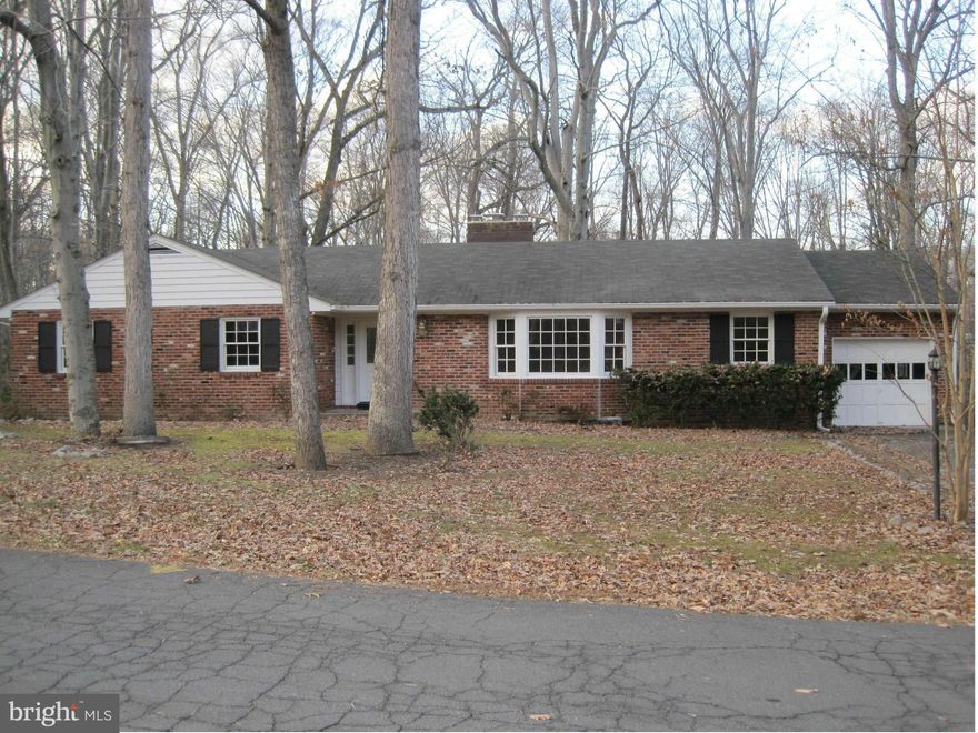 Avail. Sept. 1. Beautiful custom-built brick rambler (3 bedrooms, 2 baths) on 1/2 acre wooded lot in Graham Park Shores neighborhood. Hardwood floors on main level. Kitchen cabinets/floors updated in 2014. Two wood-burning fireplaces. Deck off family room on main level. Patio off rec room in basement. Huge room in basement.  TONS of storage. Short distance from a beautiful view of the water.