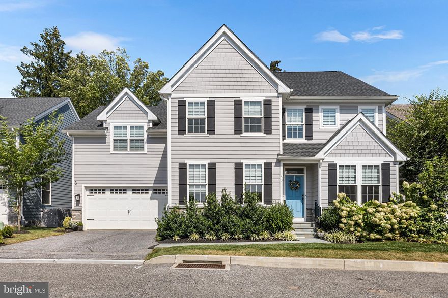 Welcome to Berwyn Village, where carefree and maintenance-free living meets convenience and comfort. This 4-year-old home is ideally located in the #1 award-winning T/E School District and within walking distance to the town of Berwyn, the train station, and schools. Whether you’re managing a busy work schedule, juggling family life, or love to travel, you’ll appreciate the peace of mind knowing your home is cared for while you’re on the go. The elegant Belton model blends timeless style with thoughtful design. At the heart of the home is a gourmet kitchen featuring Bosch appliances, quartz countertops, tile backsplash, 42" Century cabinets, and an oversized center island with breakfast area. A butler’s pantry offers the perfect spot for a wet bar, serving space, or extra storage. The kitchen flows seamlessly into the sun-drenched great room with gas fireplace and custom built-ins, while the formal dining room provides a welcoming space for special gatherings. Gleaming white oak hardwood floors run throughout the first floor, adding warmth and elegance to the open layout. Unique to this home is the option for a first-floor primary suite (currently used as a den) in addition to the expansive second-floor primary suite—an ideal setup for multi-generational living. The main-level suite includes a large walk-in closet and a spa-like bath with oversized walk-in shower and double vanity. Upstairs, the primary suite features a sitting room (currently a workout space), two walk-in closets, and a luxurious bath with walk-in shower, double vanity, and private toilet. Completing the second floor are a laundry room with utility sink, a loft (used as an office), two additional bedrooms, and a shared hall bath with double vanity and tub/shower. Step outside to a private bluestone patio with awning, surrounded by professional landscaping and one of the largest, most private backyards in the community. The neighborhood is thoughtfully tucked away with no through traffic and enhanced by lush plantings and a 6-foot western cedar privacy fence for a quiet, nestled feel.
The HOA handles lawn mowing, leaf cleanup, annual mulching, snow removal (driveways, walkways, and roadways), and trash, allowing you to fully enjoy this rare opportunity for low-maintenance, luxury living in the heart of Berwyn.