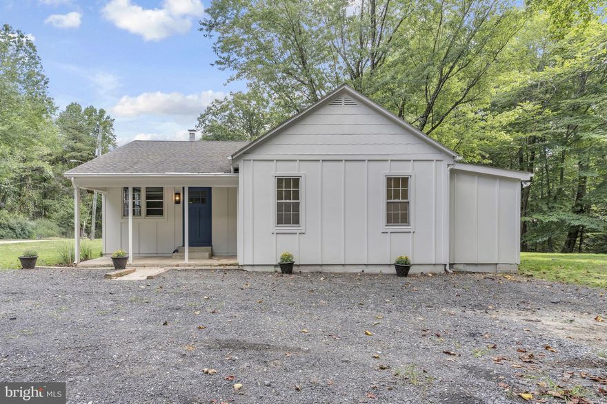 Beautifully renovated rambler situated on a large (.86 of an acre) private lot at the end of Webster Lane. This home backs to woods, offering peace and privacy with no HOA restrictions—perfect for bringing your RV, heavy equipment, or recreational vehicles. Inside, you’ll find a bright open floor plan with a spacious living room, flexible open area for an office, and a completely updated eat-in kitchen featuring new quartz countertops, stainless steel appliances (refrigerator, electric stove, dishwasher, exhaust fan, deep sink), modern cabinetry, LPV flooring, recessed lighting, and a brand-new sliding glass door that leads to the deck and backyard. The owner’s suite offers comfort with new carpeting, recessed lighting, and a gorgeous en suite bath featuring designer tile shower surround, raised vanity, decorative mirror, updated fixtures, and LPV flooring. The renovated hall bath includes a new tub/shower combo, vanity, mirror, lighting, toilet, and flooring. Two additional guest bedrooms provide great space for family or visitors. Other updates include all-new carpeting, new interior doors, and a brand-new dual-zone mini-split system for energy efficiency. Enjoy outdoor living on the large covered concrete porch. The oversized gravel driveway accommodates up to 6 cars, and there’s a backyard shed for additional storage. Conveniently located within a block of the elementary school and park, and just minutes to Joint Base Andrews and National Harbor. This home is perfect for a First Time Home Buyer looking to start their homeownership journey.