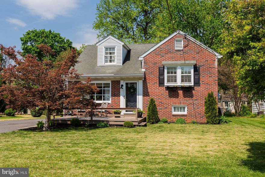 Welcome to 1441 Hollywood Drive, an elevated cottage style brick home in the desirable Country Club Heights neighborhood. This 3-bedroom, 2 full bath home features beautiful hardwood floors throughout, crown molding, vaulted ceilings, built-ins, deep window sills and an abundance of natural light. 
The main level offers a formal living room flowing into the dining room. A vaulted beadboard ceiling with wood beam accent gives the kitchen that cozy, custom feel.  Family room features vaulted coffered-style vaulted ceiling detail, brick fireplace and a charming Dutch door. Upstairs, you'll find three bedrooms and a fully updated bathroom with a double sink quartz vanity and sunlight coming in the skylight. The spacious primary bedroom on the upper level includes custom built-ins and a walk-in closet. The lower level provides a flexible bonus living space with a finished family room and full bath with recently tiled shower and laundry room. Recent updates include a new central AC and heat pump (2022), hot water heater (2025) and exterior light fixtures (2023) Enjoy the large paver patio and flat backyard. Great walkable neighborhood in a  convenient location close to all major routes and downtown Lancaster.