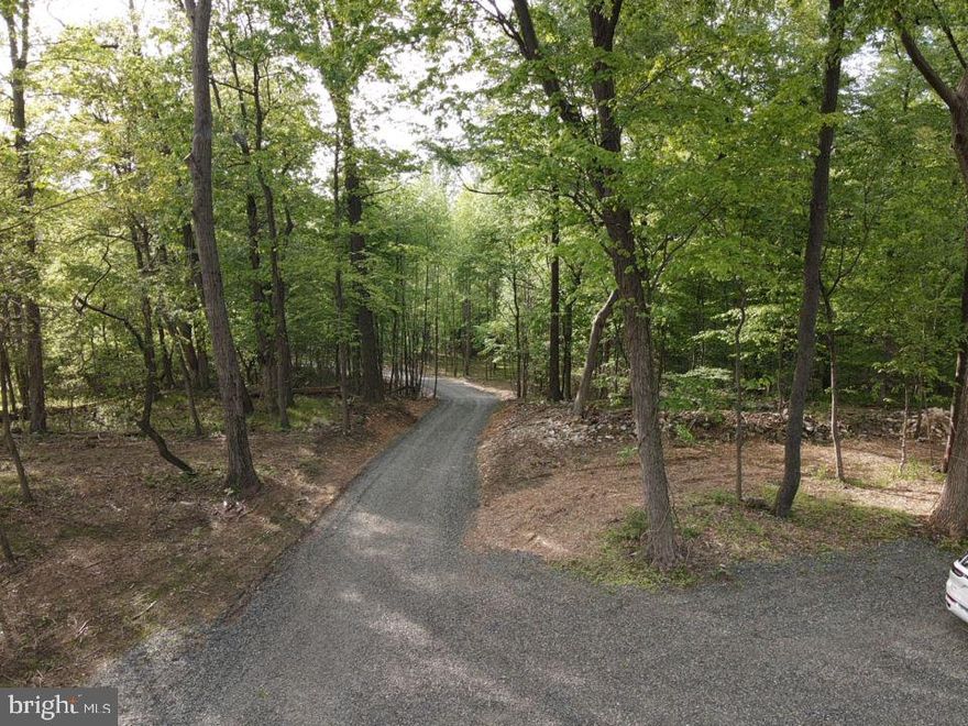 Incredible opportunity to own 29.41 acres of beautiful, raw land in a peaceful and private setting, located within the Brandywine Heights School District. This property offers a great blend of seclusion and accessibility, just minutes from Route 100 and convenient to Berks, Lehigh, and Montgomery Counties.

Approximately 4.5 acres have been cleared for a potential future home site. Key features include a stone driveway, two approved perc test locations (one suitable for an at-grade septic system), a 200-foot deep well, and 400-amp electric service. The property also offers possible subdivision potential (buyer to verify with township).  

This is a rare opportunity to build your dream home, create a private retreat, or explore development possibilities. Bring your own builder and your vision to this truly special property.  Click the virtural tour icon to view a drone tour of the property.  Do not access the property without a scheduled showing.