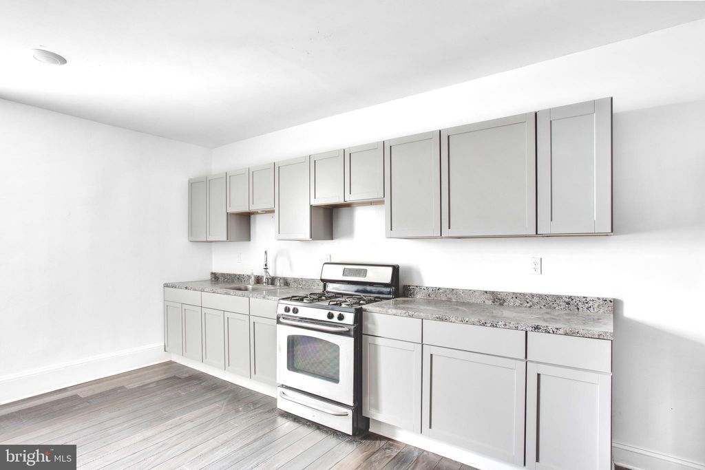 Photo of 2212 W Fayette Street, BALTIMORE, MD 21223 (MLS # MDBA2182774)