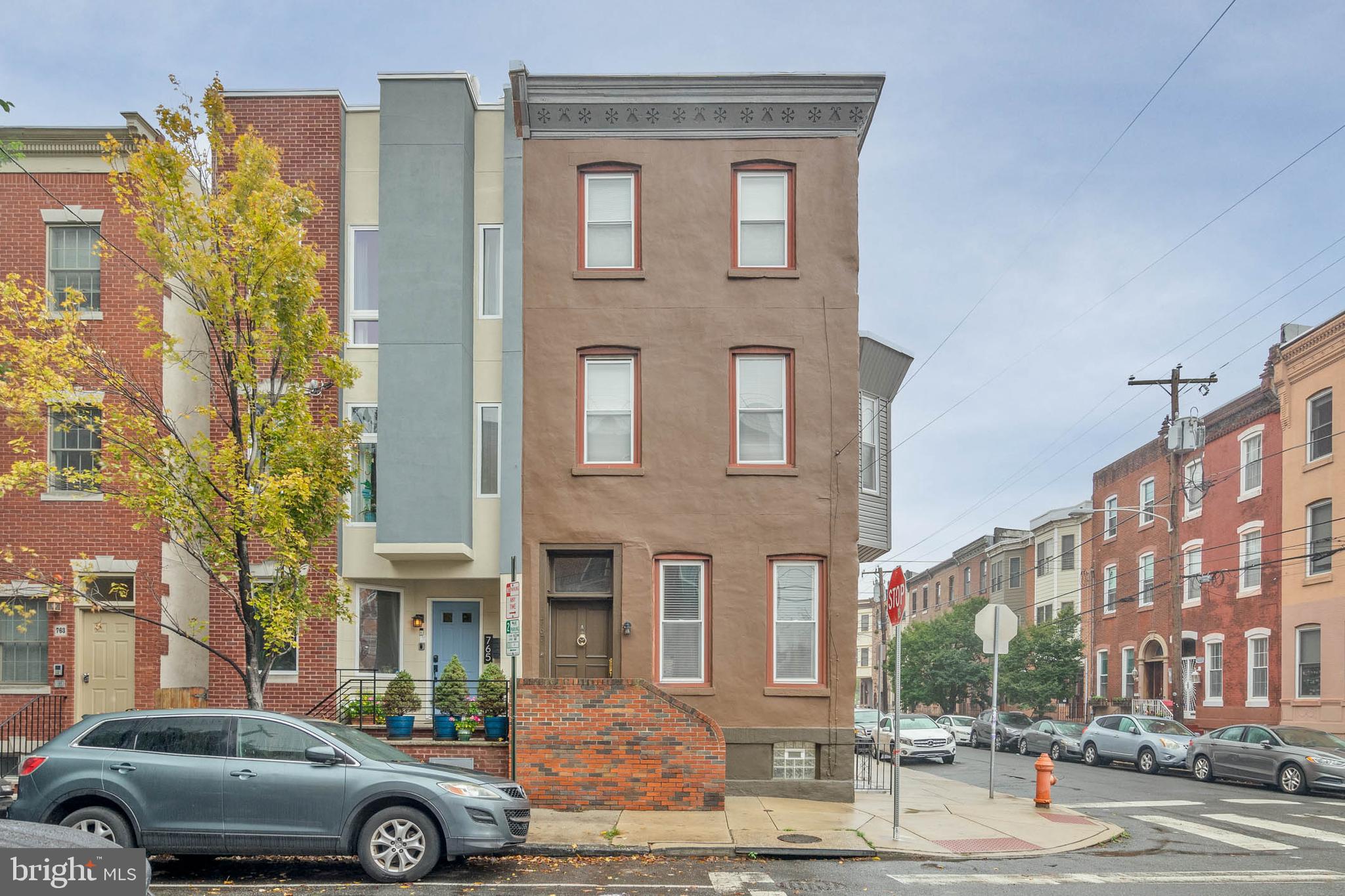 Incredible, fully occuped, Triplex in the heart of Graduate Hospital with parking. Welcome to 767 S. 15th Street, an amazing multi-family property that features one, 3 bedroom unit and two, 2 bedroom units, plus garage that's currently being used as storage! Unit A features 3 bedrooms, 2 baths and rents for $2753.77, 7/28/25. Unit B has 2 bedrooms, 1 bath, $1950, 6/28/25. Unit C is a 2 bedroom, 1 bath, $1800, 6/28/25. The garage is currently vacant but is projected to bring in $450 monthly. These beautiful apartments all have hardwood and tile floors, updated kitchens and baths and in-unit laundry. Please check out the Income and Expenses in the documents section. Super convenient location close to shopping, restaurants, public transportation, the Center City business district and so much more! Some photos are from previous listings.