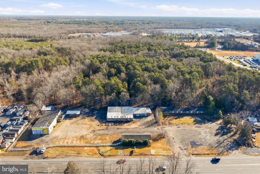 Formerly home to a small engine repair business and Massaponax Building Components, this offering includes three adjoining parcels—49A-1-A1, 49A-1-B, and 49A-1-C—totaling 2.77 acres. With approximately 475 feet of road frontage in a prime redevelopment corridor along Patriot Highway, the property currently includes several derelict buildings and a small workshop. The property is being sold strictly as-is. Buyer is responsible for all inspections, surveys, and due diligence regarding rezoning and redevelopment potential.