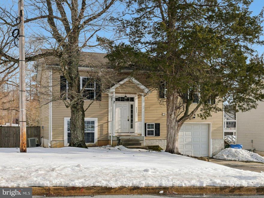 Well-maintained split-level home in the heart of Bel Air offering flexible living space and key system updates! The upper level features a bright living room with laminate wood flooring and an open flow into the kitchen, complete with stainless steel electric appliances. Three comfortable, carpeted bedrooms are located on this level, including a spacious primary suite with its own private full bath with shower. A full hall bath with tub serves the additional bedrooms. The lower level expands your living options with an additional bedroom and a nearby full bath with shower—ideal for guests, in-laws, or a private home office setup. The finished family room offers great space for relaxing or entertaining and includes sliding glass doors that lead to the patio and fully fenced backyard—perfect for outdoor gatherings, pets, or play. Major updates include HVAC (2013) and roof (2013), providing added peace of mind. Conveniently located near shopping, dining, and commuter routes, this home combines functionality, location, and value.  Mortgage savings may be available for buyers of this listing.