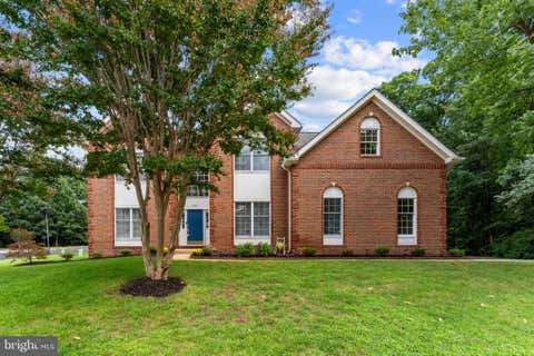Photo of 5045 Worthington Woods Way, CENTREVILLE, VA 20120 (MLS # VAFX2337086)