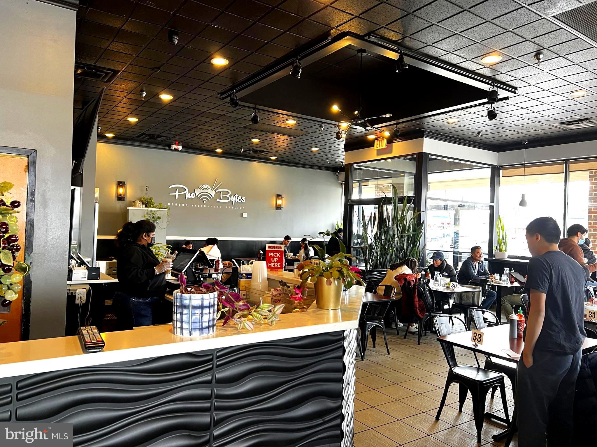 THRIVING MODERN VIETNAMESE RESTAURANT BUSINESS FOR SALE - PRIME FAIRFAX LOCATION! This turnkey business boasts a strong monthly gross income of about $70,000 to $77,000. Excellent opportunity for a new owner to take over this highly visible location at sought-after Fairfax Centre with daily traffic counts of 41,000 cars. This well-established restaurant offers a modern designed interior, creating a trendy and inviting atmosphere that has made it a local favorite. Key features include a fully equipped kitchen, ready for immediate operation, self-service kiosks for customers minimizing operating expenses, a walk-in freezer & refrigerator with ample storage space, spacious dining area with seating for 72 guests, two spacious restrooms convenient for patrons, optional drive-through window in the kitchen area for pickups, additional patio areas for out door dining experience (needs permit), and a professional website for easy online ordering/delivering via DOORDASH, GRUBHUB and UBER EATS. Comprehensive training and support provided for a smooth transition, plus a dedicated team of experienced and well-trained staff already in place. This is a fantastic opportunity to own a thriving restaurant with a proven track record. Please DO NOT visit the business directly. All inquiries and showings must be scheduled through the listing agent. Contact listing agent for more details.