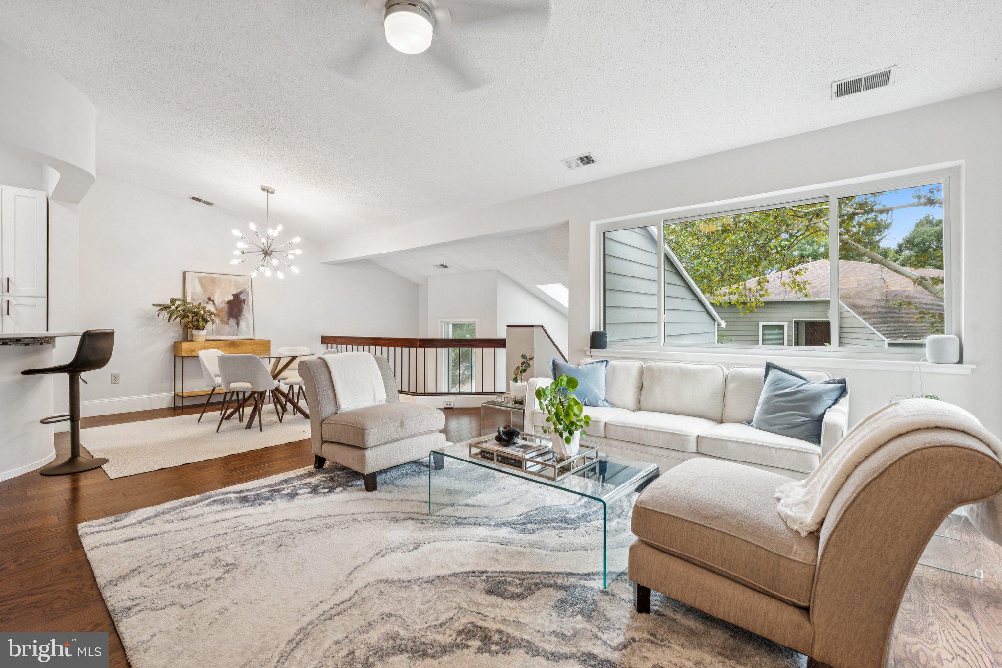 This contemporary 1BR/1BA top-floor corner unit delivers soaring vaulted ceilings, skylights, and an open, light-filled layout. Enjoy hardwood floors throughout, a renovated kitchen with stainless steel appliances, an updated bath, and a spacious bedroom with dramatic ceilings. Cozy up by the wood-burning fireplace or step out to your private balcony. In-unit washer/dryer and ample parking make life easy.
Set in the sought-after Villa Ridge community, you’ll have the Turquoise Trail, shopping, dining, and the Lake Audubon pool right outside your door. As a Reston Association member, enjoy 4 lakes, 15 pools, 49 sports courts, and 50 miles of trails. All just over a mile to Wiehle-Reston Metro and minutes to Reston Town Center, Dulles Toll Rd, and Dulles Airport. Condo fee covers water, trash, and exterior maintenance.