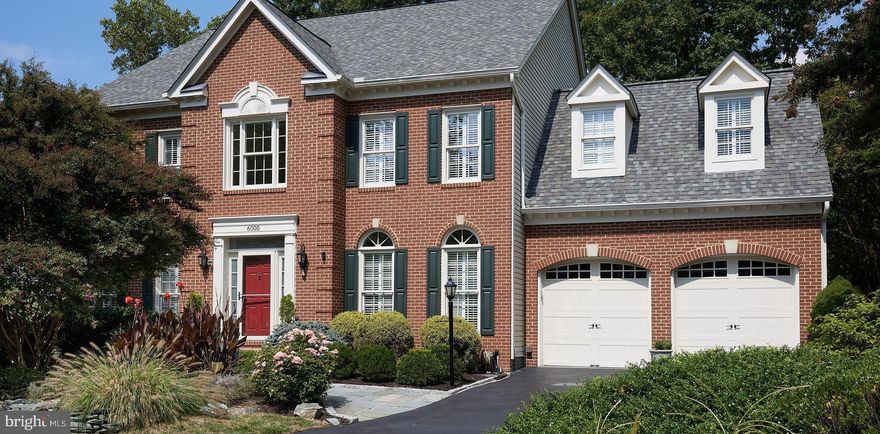 Unique Oasis in a Walkable Community!
This grand remodeled home makes a strong first impression: two-story windows and a 17 foot ceiling fill
both levels with brilliant southern light. The open and luxurious foyer, living and dining rooms, and
hallway feature high ceilings, Palladian windows, 3-part crown, chair molding, built-in cabinetry and a
stately staircase.
<br>
The Great Room stretches nearly 40 feet encompassing kitchen, dining area, and family room space open
to a 16 by 32 foot deck. The center-island kitchen has wood white cabinets, gray glass tile, an induction
cooktop, white quartz counters and ample storage (including a food pantry, walk-in butler’s pantry and
wet bar). Informal dining is in a bay-window area of the Great Room. A gray fieldstone fireplace
anchors the family-room space to its natural setting of towering Oaks, Hickory and Dogwood trees behind
a wooded glen. The kitchen windows and the deck (with cable railings and Brazilian hardwood cap rails)
have a commanding view of the boulder-strewn pond and waterfall. Landscape lighting makes the scene
equally beautiful after dark. Mature, professional landscaping graces the entire property.<p>
<br>
The second level features an enormous primary suite with tray ceilings, Carrara marble bath and a sitting
room overlooking the pond. There are four ample bedrooms and three full baths on the second level with
a fifth bedroom, full bath and enormous rec room in the walkout lower level with French Doors. The
home’s amenities include a luxury laundry room and a two-car EV ready garage with built-in storage.<p>
<br>
This private setting on a cul-de-sac is a short walk to Wildwood’s 10 restaurants, Balducci’s, pharmacy,
dry cleaners and boutiques. The library, Fleming Park and the Bethesda Trolley Trail are also nearby.
This open-concept home with contemporary renovations offers a unique, private oasis for modern living.This open-concept home with contemporary renovations offers a unique, private oasis for modern living. <br>
Backyard is fully enclosed with gates and 6 foot fencing.  Underground utilities to this cul-de-sac community, so few power outages.