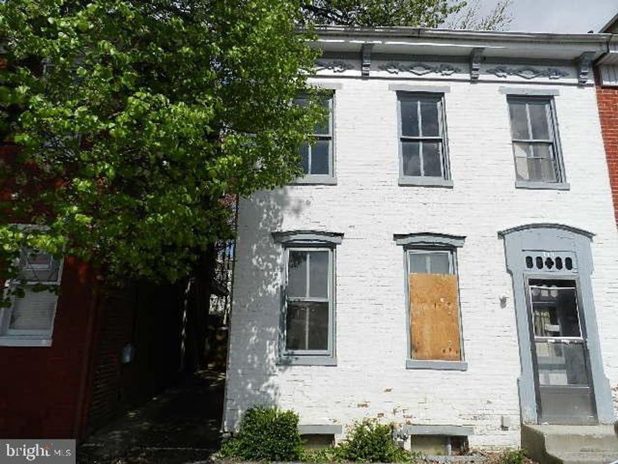 Brick semi-detached 3 bedroom, 1 full bath home. Large eat-in kitchen, living room / dining room combination, walk up attic, fenced backyard with outside access to basement. Plenty of storage space.
