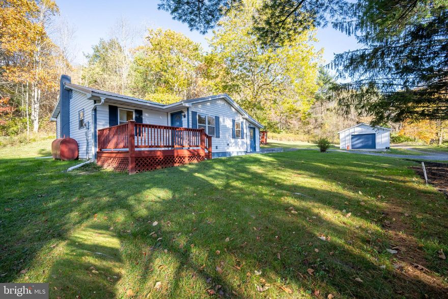 Remodeled Rancher Near the North Branch Potomac River
This charming 3-bedroom, 1-bath rancher has been completely remodeled, with all new appliances. Located within walking distance of the scenic North Branch of the Potomac River, the home offers both convenience and natural beauty at your doorstep.
A recently enclosed front porch with a wood stove provides extra warmth and a welcoming spot to relax year-round.  The property also includes a spacious 33’ x 18’ detached garage—perfect for vehicles, storage, or a workshop—as well as a wood shed for added utility.
Call now for your private tour!