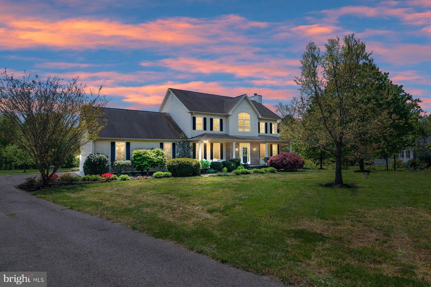 Looking for SPACE and PRIVACY in a Rural setting, but yet close to everything?! Look no more... your NEW HOME awaits here in "Hunters Ridge" on Maryland's Tranquil Eastern Shore! Perfectly perched on almost an Acre of land, backing to a forest of trees and overlooking the serene community POND... it just doesn't get any better than this! As you drive up the long driveway, you just take a deep breath, listen to the peaceful sounds of nature and say THIS IS THE ONE! The sprawling Front Porch is so welcoming and is great for porch nights under the stars.. bring those rockers! Grand 2 story entrance with Gleaming Hardwood Floors, Wood Stairs and Black Wrought Iron Railings are sure to please!  The spacious Main level has a formal Dining Room with custom chair rail, Home Office, Living Room with NEW carpet and a cozy Fireplace, Laundry Area/Mud Room with NEW Washer & Dryer, Full Bath and a top-notch Kitchen! Chef's delight here in the eat-in kitchen with all NEW Stainless Steel Appliances, Quartz Counters, Large Quartz Island, Dry Bar & Coffee area, Cherry Cabinets, Recessed lighting, Upgraded 5 Burner Gas Stove & More! Walk out onto the MASSIVE Screened in porch and enjoy those crab feasts while sitting under the cooling ceiling fan on those hot days and nights or on the cooler nights enjoy good times around the custom paver firepit! The upper level has the coolest built-in day bed in the Loft area, 3 generous sized bedrooms with large closets, and an INCREDIBLE Primary ensuite that will blow you away! This owner's suite has Glamorous trey ceilings, Fireplace with mantel, walk in closet and one pretty AMAZING Bathroom with dual vanities, Tiled OVERSIZED Shower and a toilet closet! There is a huge walk in Attic space that makes life easy for storing items and accessing them or finish this area off for even more SQFT!
Boasting OVER 4600 Sqft of finished living space, inclusive of the SPECTACULAR Finished Basement complete with a Bedroom, another Full Bath, tons of extra room for games or workout area and a Custom Built-In Bar for the entertainer's dream! The 3 car garage has tons of storage space with a separate 2 bay storage area and cabinetry! In the backyard there is a robust garden with mature asparagus just beyond the shed in addition to chestnut trees, fig trees and blueberry bushes throughout the back of the property!  Want chickens? Well, you can have them here and the Chicken Coop is included! This is truly A MUST SEE Property!