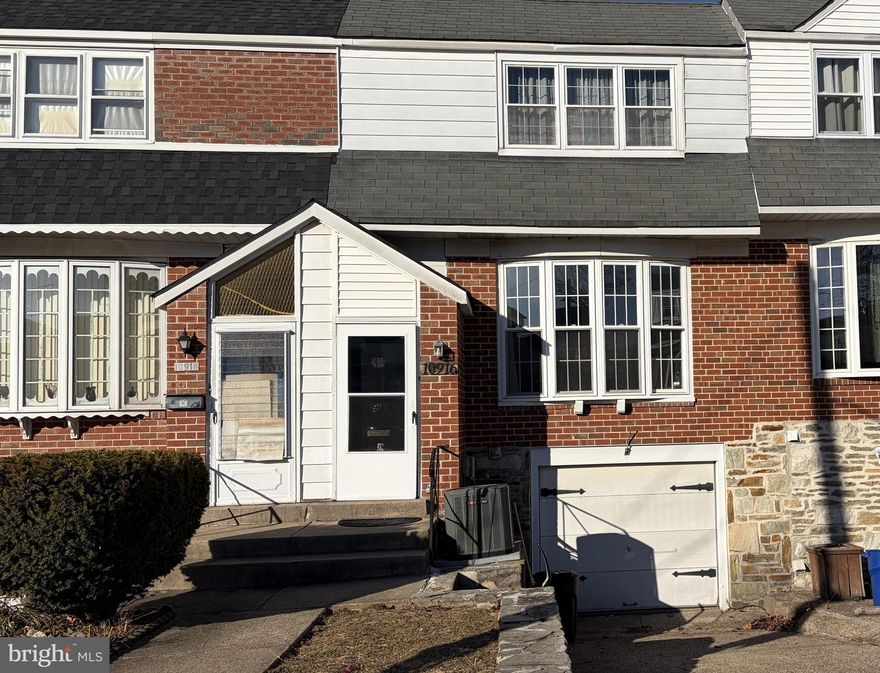 Welcome to 10916 Modena Place, a well-located home in the desirable Northeast Philadelphia area. Nestled on a quiet residential street, this solidly built masonry home offers exceptional durability, character, and long-term value.

The home was renovated and modernized in recent years, thoughtfully blending contemporary updates with the timeless appeal of classic construction. The warmth and charm of brick masonry provide not only visual appeal but also the strength, energy efficiency, and sound insulation brick homes are known for.

Inside, bright living spaces and abundant natural light create an inviting atmosphere. The interior showcases custom railings and beautifully crafted wood staircases, adding elegance and craftsmanship throughout the home. Faux wood wall trim enhances the living areas, delivering a refined, finished look while maintaining a warm and welcoming feel.

The updated layout is ideal for both everyday living and entertaining. Bedrooms serve as comfortable private retreats, while additional flexible space can be used as a home office, recreation room, or storage area.

Outside, enjoy a private yard perfect for relaxing, gardening, or hosting gatherings. Conveniently located near shopping, dining, parks, schools, public transportation, and major roadways, this home offers easy access to everything Northeast Philadelphia has to offer.

Whether you are seeking a move-in ready residence or a well-built home with enduring style, 10916 Modena Place presents an outstanding opportunity in a well-established neighborhood.

Schedule your showing today to experience the warmth, craftsmanship, and quality this home has to offer.