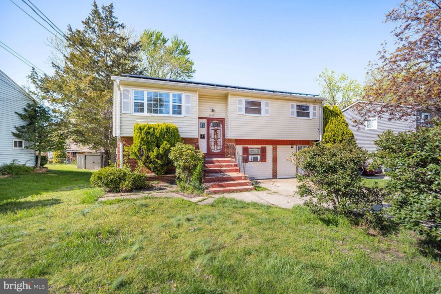 OFFER DEADLINE TUESDAY 7PM On the market for the first time in nearly 50 years! This well-loved split-level rambler is full of potential and ready for its next chapter. Situated on a quiet street just steps from public transportation and minutes from downtown DC, this home offers a spacious layout and fantastic location. The main level features a bright living room, dining area, kitchen, and coat closet. Originally designed as three bedrooms, two rooms have been combined to create a large primary bedroom—easily converted back to the original layout. A second bedroom and a full bathroom with recently updated shower complete this floor. The lower level offers generous living space, including potential for up to three additional bedrooms and an in-law suite. A second full bathroom was added in recent years. The level also includes a laundry area, storage, and access to an enclosed sunroom that leads to the large backyard. Additional features include a newer roof with solar panels for energy efficiency, a two-car driveway, and ample street parking. With some cosmetic updates, this home will truly shine. Conveniently located with easy access to DC, the Inner Harbor, and Northern Virginia. Don’t miss this rare opportunity!