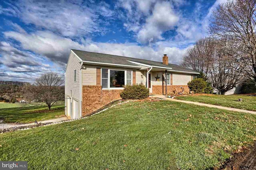 Great rancher with walkout lower level/guest suite!  Beautiful farmland view!  Four season room off very large eat-in kitchen!  MBR has MBA & large walk-in closet! Oversized 2 car end load garage is heated!  Plenty of storage and 2 sheds available too!  Check out this great Dallastown home today!