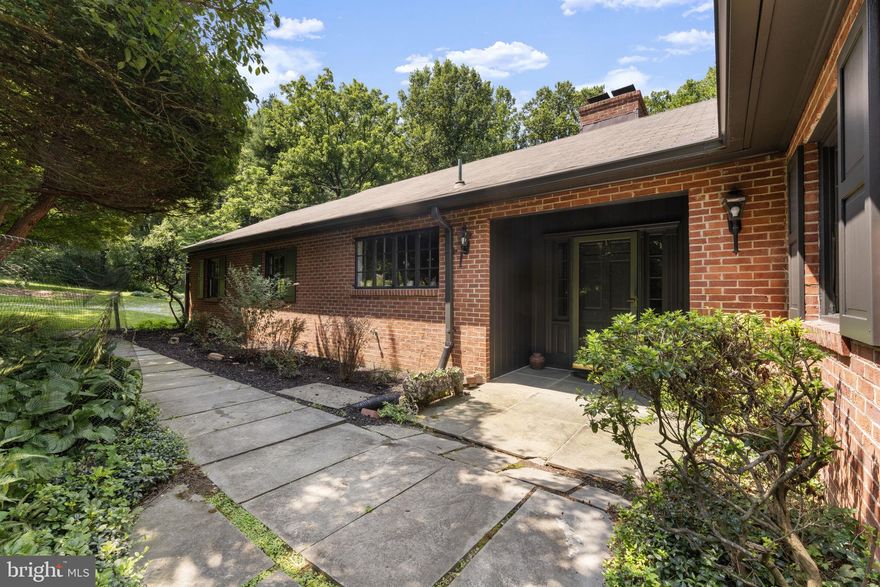 Welcome to 11800 Stoney Creek Rd, a rare opportunity to own a secluded, move-in ready retreat in the highly sought-after Churchill school cluster. Set on over three acres of private, wooded land, this property offers a peaceful escape without sacrificing convenience, with easy access for commuting to nearby business districts. 

Step inside to the main level, which features a primary bedroom with an en suite bath and two additional bedrooms that share a hall bath. The large living room is a highlight, with a gorgeous fireplace and windows spanning the length of the room that look out on the wooded lot. The main level also features a separate dining room that accesses a screened-in porch. The walkout lower level offers a spacious and bright retreat with a fourth bedroom, a third full bath, and a large rec room with full natural light. 

The property’s expansive grounds are the main event, inviting you to create your own outdoor sanctuary. Whether you envision lush gardens, a quiet patio, or a play area, the large, private lot provides endless possibilities for outdoor enjoyment. Ample storage is available, including a dedicated shed and basement storage room that provides additional space for hobbies, recreation, or future expansion. 

This distinguished residence blends classic charm with the potential for customization, all within a coveted location known for its excellent schools. Don't miss this chance to make this tranquil, wooded property your own.