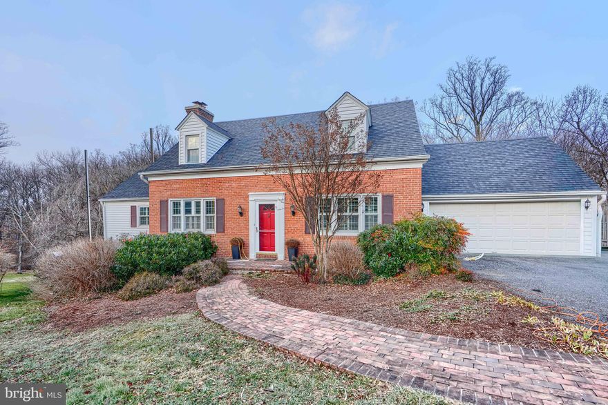 This Ruxton home is a rare find! Set on a stunning 1+ acre property backing to a beautiful yard, woods and acres of undeveloped land-this home is your private oasis close to everything! Follow the winding brick walkway to the front entrance and experience the great circular flow from the entry foyer throughout the main level which includes a separate dining room, kitchen that opens into a glass filled sunroom/den framing the beautiful back vista, spacious living room, lovely family room with built in bookshelves and large powder room.  Upstairs are 3  bedrooms and two baths and the finished walk out lower level provides a large recreation room, full above-grade 4th bedroom and a full bath. Enchanting window seats, beautiful built-ins and California Closets add style and functionality throughout the house. This home also features a 2 car garage, additional tractor/storage room/workshop, large deck off the kitchen, and lovely landscaping with lower yard currently made into low maintenance wildflower meadow with walking paths! Brand New Roof, Gutters and Siding plus additional updates make it a house not to miss! More Pics Coming Soon!