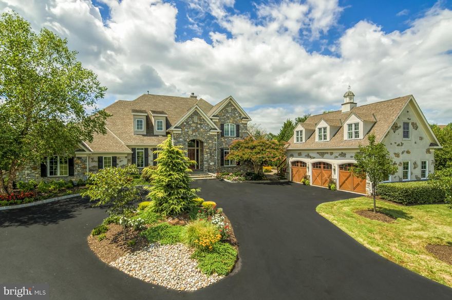 Phenomenal income-producing Estate/Vineyard on 23 exceptional acres.  Over 8000 finished, plus custom Carriage House with  apartment.  Breathtaking views, scenic vista-the only natural wild trout stream in N. VA, a 5-acre vineyard with award-winning Chambourcin Grapes. One-of-a-kind Schulz home. Dramatic entry, main level owner's suite, gourmet Granite Kitchen, built-ins, Pool, gym, sauna, more.