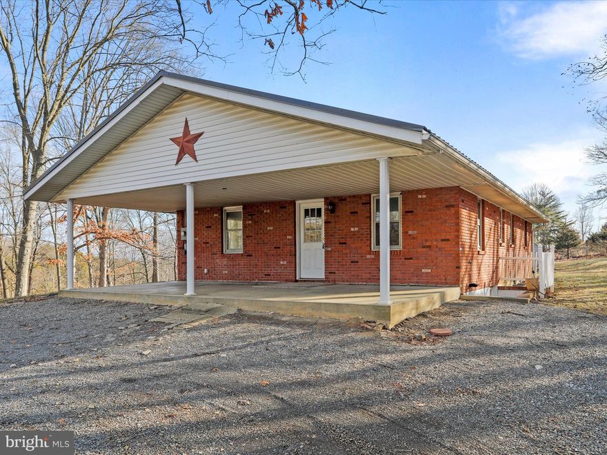 Everything you have been waiting for! This beautiful brick rancher sits on just under 2 acres of Wild & Wonderful WV between Keyser and Fort Ashby. The home offers 3 bedrooms and 1 bathroom on the main floor. Large 2 car detached garage. Part of the basement was started to be transformed into a lounge/bar area and is just waiting for you to complete it and make it your own! Roughly 3 year old metal roof and gutter replacement, well pump around 4 years old, hot water tank and water softener are under a year old.