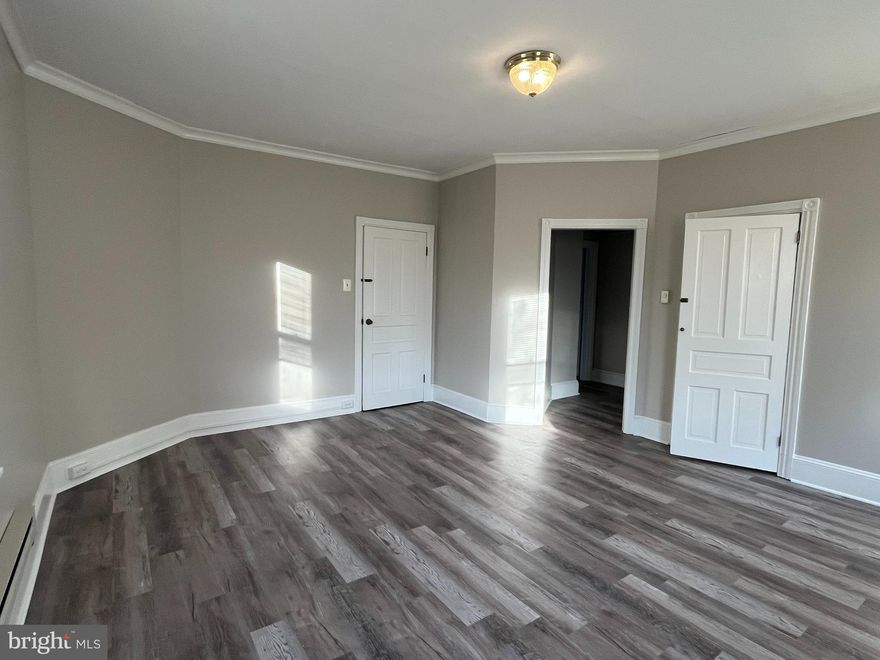 This bright, spacious apartment just received a major upgrade! New kitchen cabinets, counter and stove. New flooring and paint throughout .  This home is conveniently located on a dead-end street, less than 1 block from the Oreland Train Station, and walking distance to convenience stores, pizza shops, parks and more! Washer and Dryer are conveniently located right outside your apartment door! This is a 2nd floor walk-up apartment. Square footage is estimated to be about 1000sf. Looking for a renter ASAP!