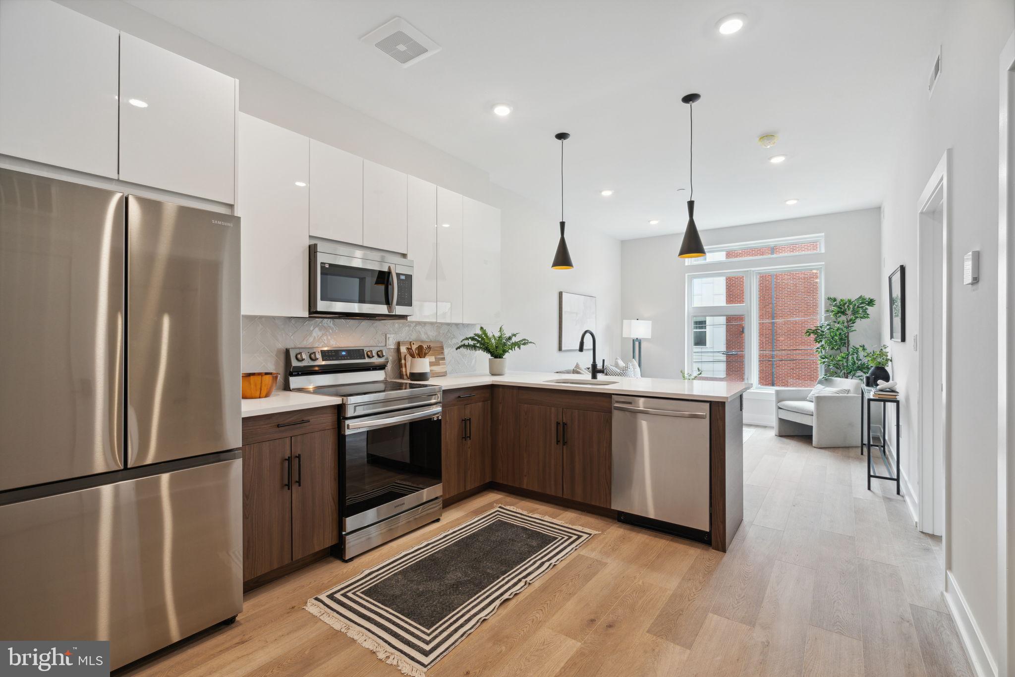Tucked away just off Girard Avenue, The Weston offers a collection of 80 thoughtfully designed 1 and 2-bedroom units.
Situated on the outskirts of the sought-after Northern Liberties and East Poplar neighborhoods, The Weston places you steps away from local entertainment, trendy food & beverage hangouts, and the vibrant energy of Broad Street.
At The Weston, we've created snug spaces that are designed with comfort and connection in mind. From the plush lobby on the ground floor, to the community clubhouse, sun-drenched rooftop, and fitness center, you'll find everything you need to await your Uber in style, host events, and break a sweat. NEED A BREAK? Pop up to our stunning rooftop lounge, offering breathtaking views of the city.
With endless possibilities to explore around town, The Weston will offer bike storage and limited parking for a fee.
Amenities include:
-Furnished roof deck with dog run
-Community kitchen
-Fitness center
-Game room
-Bike storage
-Parking *Limited space
-Controlled access
-Package room