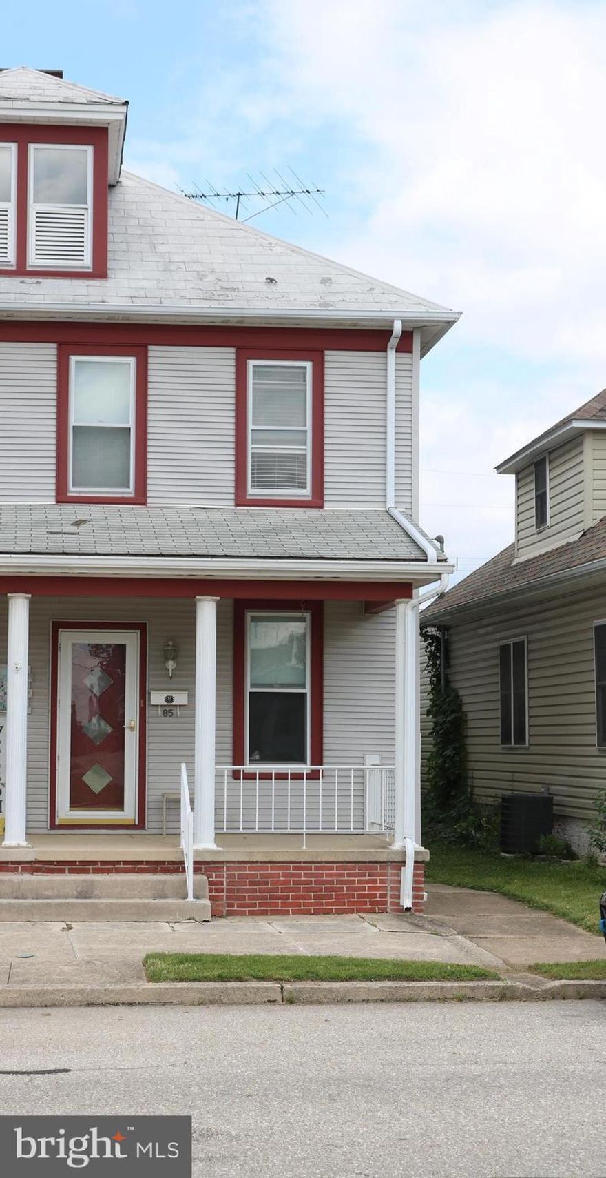 Welcome to this 3 bedroom, 2 full bath semi-detached with 2 car garage in the Hanover Borough! YES!! Both sides of the garage go with this property!  Home has a  covered front porch and a covered back patio. Large fenced yard and traditional floor plan. Kitchen island, full bath off the kitchen, Dining room and Living room. 1st floor laundry in the kitchen area. 3rd bedroom is a walk through and the primary bedroom has a full bath and balcony. All appliances are included. Hot Water BB Heat in upstairs bedroom and bath- the other 2 bedrooms are gravity heat. Electric heat in first floor bath. Other rooms are Hot Water BB.  Home is an estate is being sold as-is.