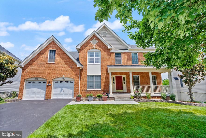 Presenting an exceptional Toll Brothers Astor-Williamsburg model in The Hunt at Belmont Country Club, this impressive home offers 5 bedrooms and 5 full baths, with a welcoming front porch and a scenic backdrop overlooking a natural pond. A grand two-story foyer and family room set the tone for the elegant interior, featuring a hardwood staircase, 9-foot ceilings, and gleaming hardwood floors. The main level includes a private study, a spacious family room with a gas fireplace, ceiling fan, and a wall of windows, as well as an optional solarium with a vaulted ceiling. The gourmet kitchen is beautifully appointed with granite countertops, a center island, pantry, and gas cooktop, complemented by a full bath and separate laundry room on the main level. The luxurious primary suite offers double walk-in closets and a master bath with dual sinks, a garden tub, and a separate shower, while the second bedroom also enjoys a private en-suite bath. Three full baths are located on the upper level, which features new wall-to-wall carpeting and a second-story overlook to the family room. Outdoor living is enhanced by a 40-foot custom Trex deck overlooking the pond, and a finished walkout basement offers a second kitchen, recessed lighting, a fifth bedroom, storage rooms with shelving, and a wine cellar, leading to a spacious stamped concrete patio. Additional highlights include a lawn sprinkler system, extensive landscaping, an alarm system, and a media wiring package, making this an outstanding opportunity for luxurious living in a premier community.