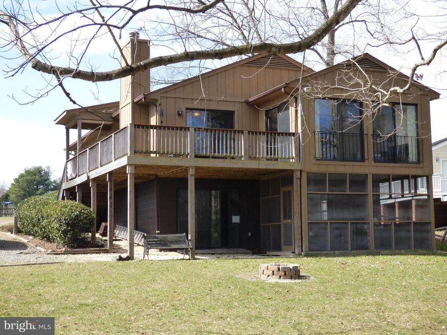 Enjoy a piece of Paradise in beautiful Lake Caroline. This 3 BR/3BA Raised Rambler w/ nearly 1500 finished sq ft  & walkout unfinished lower level perfect for a weekend retreat or permanent residence to enjoy a recreational lifestyle; swimming, boating, fishing, watersports and much more. Panoramic views from main living area, sunroom, screened patio, & deck enhance the joys of Lakefront Living!