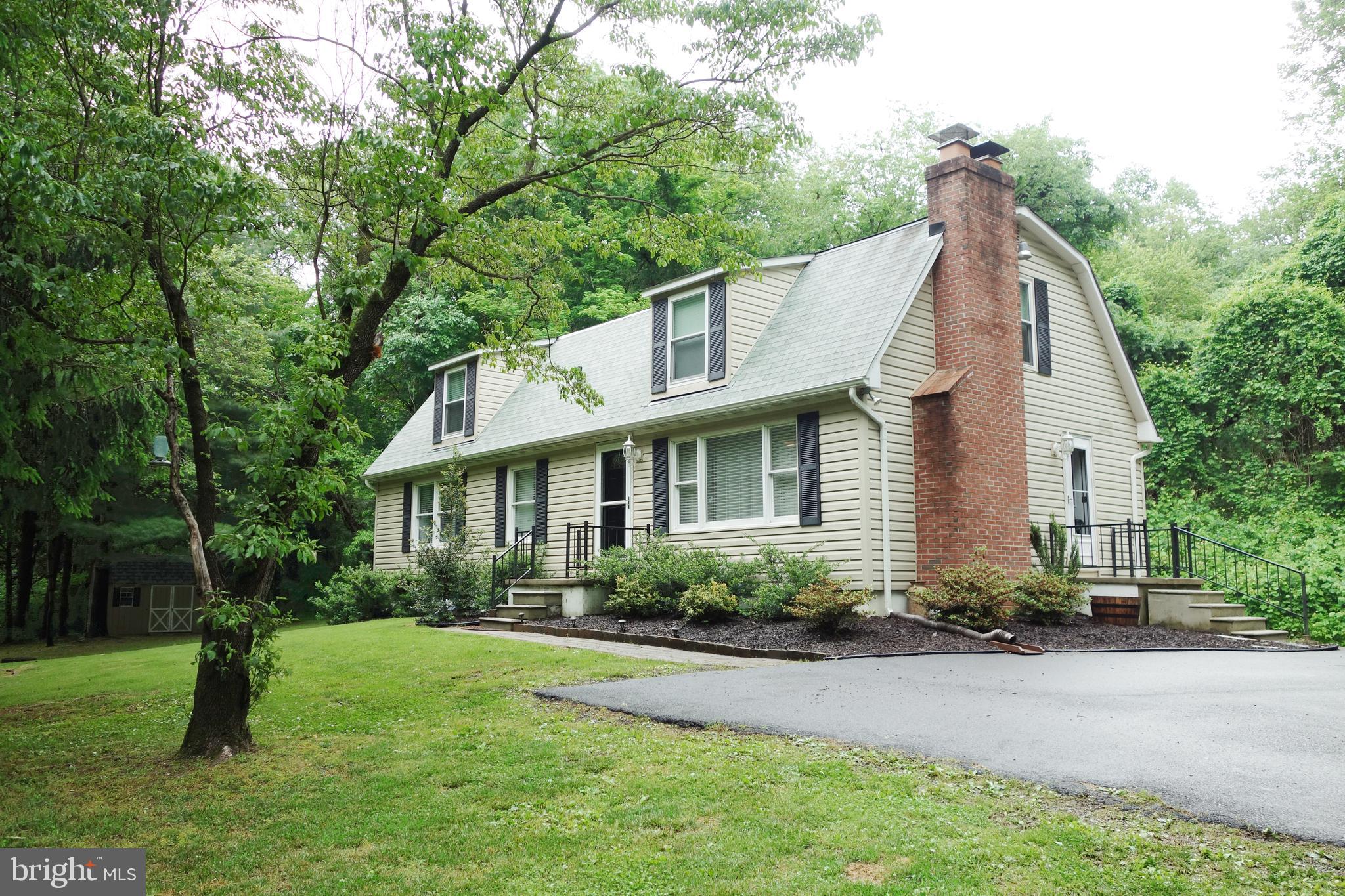 Don't let this one pass you twice, back on the market! *Please utilize our 360 Virtual walk-through by clicking the camera icon* "Location and perfection in Parkton" describes this well-appointed cape cod in the Hereford zone! This property is located within walking distance to the NCR trail, quick access to I-83, a short drive to Hunt Valley, PA & I-695! Surrounded by 3 acres of lush greenery, you'll enjoy the sights, sounds and serenity of nature while relaxing outside on your rear-patio. Once inside, you'll have the choice of four bedrooms - three of which offer en-suite full baths! The main level offers a gourmet kitchen with granite counters and stainless appliances opening up to a dining area, cozy living room with a wood burning fireplace, large master suite and an additional bedroom at the end of the hall. Upstairs it's your choice of two master bedrooms, one offers a large walk-in shower with dual sinks and the other has a shower/tub combo for those who prefer a bath-tub. The basement (renovated in '18) has vinyl plank flooring, built-ins, recessed lighting and a pellet stove ('17)! The other side of the basement has plenty of room for laundry, storage, fitness equipment and more... The well water has a conditioner, neutralizer, filter, reverse osmosis and U.V. light system all installed in '17. The roof was replaced in '15, water heater in '16, washer/dryer '16 and the shed was delivered in '16. Move in ready is an understatement with this property! The parking pad offers parking for 5-6 cars, the driveway is technically "shared" with the parcel behind but has never been used by anyone other than the homeowner. Schedule a showing today, you will not be disappointed!