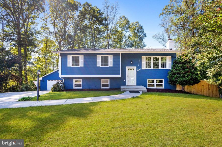 Welcome to 2656 Falmouth Court, an exceptional opportunity to own a truly unique and expansive home nestled at the end of a peaceful cul-de-sac. This impressive 8 bedroom, 5 bath residence has been completely renovated and is currently configured as three distinct living spaces, and is ideal for savvy investors, multi-generational living, or anyone seeking a luxurious, abundant space and income potential.

On the main level, step into a bright, spacious living room that flows seamlessly into the kitchen and dining area—perfect for entertaining or relaxing with family. This level features four bedrooms, three full bathrooms, a washer and dryer, and several inviting living spaces including an expansive sun room and another bonus living room, all with access to an upper-level deck for fresh air and sunshine. Fall in love with the hardwood floors and innumerable other updates the owners have made during their tenure.

The lower level features two thoughtfully designed apartment-style living spaces each with a separate entrance. While these units do not have separate permits as rentals, they provide outstanding versatility, whether you're hosting long-term guests, seeking space for multi-generational living, or any other creative use you can think of. The first unit features a spacious two-bedroom layout with a full bathroom, a full kitchen, a living area, walk-in closets, and in-unit washer and dryer. The second unit offers two bedrooms with ample closet space, a full bathroom, a full kitchen, and storage. The lower level also holds a bonus recreation room perfect for an additional entertainment space, lounge area, home gym, or play room.

The home boasts many outdoor living spaces, including multiple decks and a large fenced backyard. Pet lovers will appreciate the built-in dog washing station on the upper deck, ideal for keeping things clean after muddy adventures. 

Additional highlights of this property include a two-car garage with attic storage, a six-car driveway, a detached storage shed, ample indoor storage throughout, and a beautifully landscaped lot with mature trees offering shade and privacy. Whether you're seeking an income-generating investment or a flexible home for a variety of living arrangements, this property delivers endless possibilities.

All this just minutes from Potomac Mills, shopping, restaurants, parks, schools and so much more. Outdoor enthusiasts will love nearby Occoquan Regional Park and Occoquan Bay National Wildlife Refuge. And for commuters, you're just a short drive to I-95 or the VRE, offering easy access to Quantico, Fort Belvoir, DC and beyond.

Don't miss this one-of-a-kind property that combines peaceful suburban living with incredible versatility and value.