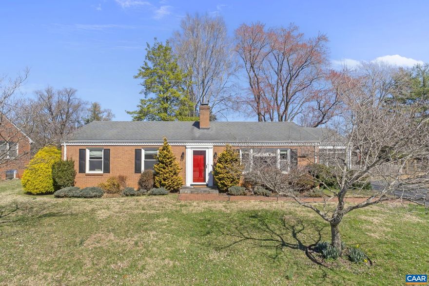 Open House Sunday 3/15 12-2pm. Bright and cheerful one-level living in Greenbrier! This charming brick home has been thoughtfully updated and is move-in ready. Recent improvements include 2 beautifully renovated bathrooms, updated kitchen with cork flooring, and refinished hardwood floors. New AC system adds comfort and efficiency. The full unfinished basement offers abundant storage and includes a French drain and dehumidifier for added peace of mind. Laundry (with sink) is in the spacious basement, with additional hookups available on the main level.  Relax on the screened porch overlooking the fully fenced, level backyard. Please note: during the bathroom renovations, the primary bedroom closet was incorporated into the beautiful baths, so the primary bedroom currently does not have a closet. Most furniture is negotiable as well!,Fireplace in Living Room