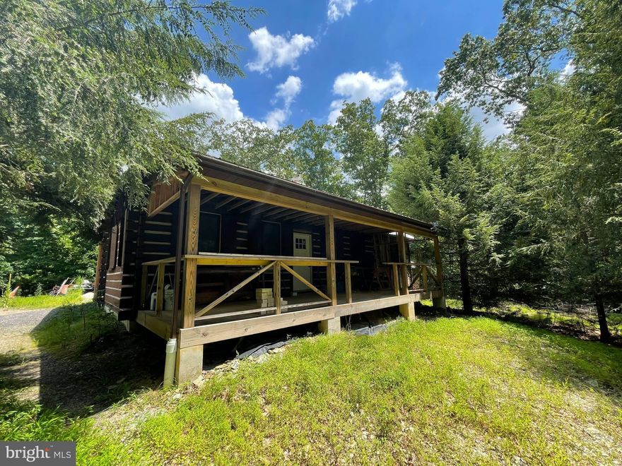 Looking for the rare opportunity to live in a secluded home?  You're in luck.  This cabin sits at the very end of Chippewa Drive in the private community of Indian Hills and is ready for you to finish it.  The home was taken down to the studs and is now poised to have new owners come in and bring your vision to complete this home to fit your needs.  Relax on the front porch while you wrap up the day.   You've got 3.67 acres that runs back right to Deer Creek and butts up against 47 acres of wooded space.  Your very own slice of peace and quiet awaits!  Check out the virtual tour to explore the possibilities.