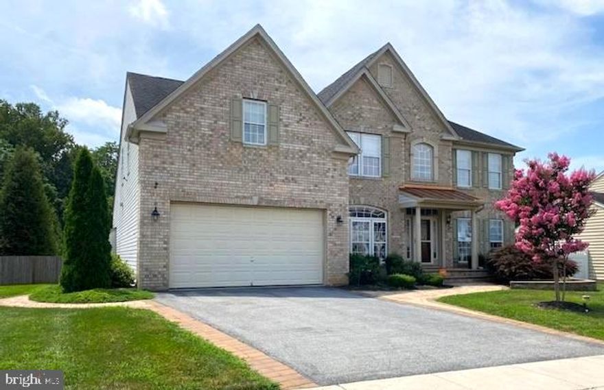 5,256 SQUARE FEET WITH 5 BEDROOMS / 3.5 BATHROOMS /  2 KITCHENS / FULLY UPDATED!!  
This stunning brick front colonial is perfectly located right in the heart of the HIGHLY SOUGHT AFTER Archers Rock community, and it's LOADED WITH UPGRADES!!  Features include dual staircases, rich hardwood and tile floors, huge gourmet kitchen, complete with a massive island.. granite countertops.. and stainless appliances, a sunroom filled with light, family room with a fireplace, oversized primary suite w/ double walk-in closets and sitting area.. double vanity bath with a jetted soaking tub, glass shower, and separate water closet, a full finished basement, and a fenced in backyard ready for your entertaining! In the basement you will find a large 5th bedroom, second kitchen, a tile bathroom with walk-in shower, along with a second family room!!
Don't miss your DREAM HOUSE!!  Schedule Your Appointment TODAY!!