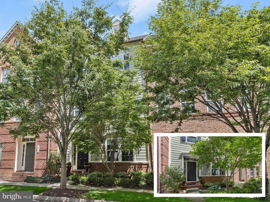 Discover unparalleled luxury in this exquisite Maple Lawn townhome, where high-end finishes and spacious living areas redefine modern comfort. Enter through the foyer that leads to the den/study, enclosed by elegant French doors, perfect for working from home with ease. The main level showcases rich hardwood flooring, upgraded lighting fixtures, and intricate moldings that exude sophistication and flow through much of the home. Ascend to the open-concept living and dining rooms, where crown molding and chair railing add a touch of classic charm. The gourmet kitchen is a chef's dream, boasting 42-inch cabinetry with convenient roll-out shelves, granite countertops, and stainless steel appliances, including double wall ovens and a gas cooktop. A stylish subway tile backsplash, breakfast bar, and spacious pantry complete this culinary haven. Enjoy casual meals in the adjoining dining space, or relax in the family room, which provides seamless access to a composite deck. Every bathroom in the home has been thoughtfully updated with luxurious stone countertops, modern lighting, and mirrors. Retreat to the top-floor primary bedroom, featuring a sophisticated tray ceiling, a cozy sitting area, and two expansive walk-in closets. The en-suite bath is a sanctuary, offering a double vanity, soaking tub, and a tiled shower. Two additional bedrooms, a full bath, and a convenient laundry room complete the upper level. The lower level presents a spectacular recreation room with soaring 14-foot ceilings, abundant natural light from beautiful windows, a gas fireplace, and a custom built-in desk, creating an ideal space for work or leisure. A detached two-car garage ensures ample parking and storage. This exceptional townhome also grants access to an array of community amenities, including an outdoor pool, community center, fitness facility, multiple playgrounds, picnic pavilion, dog park, and courts for basketball, tennis, and pickleball. Experience luxury living in Maple Lawn in this well-appointed home.