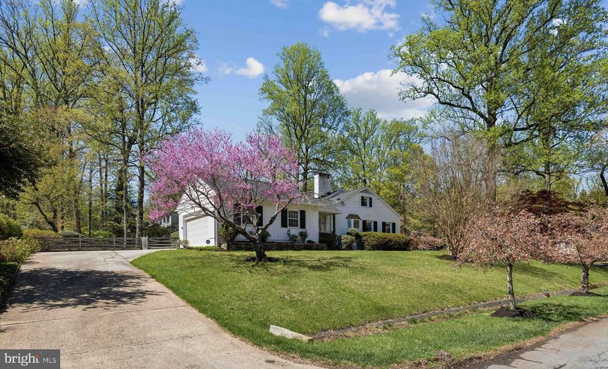 PRICE INCLUDES LAWNCARE. This charming 5-bedroom, 3.5-bathroom residence,  exudes traditional elegance with its classic brick exterior and inviting ambiance. Nestled on a generous 0.54-acre lot, this home offers ample space for relaxation and entertainment. Enjoy the warmth of two fireplaces that create a welcoming atmosphere throughout the home. With an attached side-entry garage and driveway parking. Located in a desirable Bethesda neighborhood, this home is close to local amenities, parks, and schools, and Washington D.C. ensuring a convenient and vibrant lifestyle.