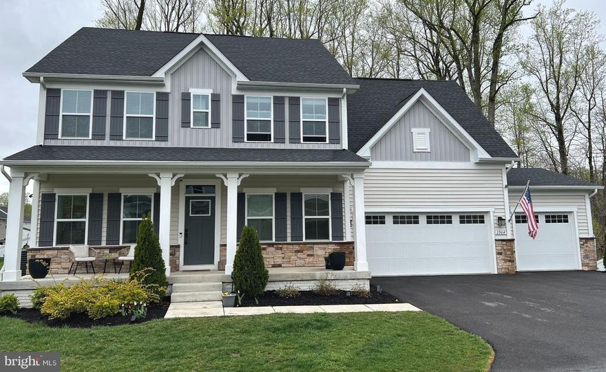 Discover this beautifully maintained, one-owner home in the desirable Heritage Woods community! Built in 2021, this four-bedroom, three-and-a-half-bathroom single-family residence offers contemporary living with a spacious open layout, perfect for modern families.

Key Features:
 * Built in 2021: Enjoy the benefits of a newer home with modern amenities.
 * Spacious Open Layout: Ideal for entertaining and comfortable family living.
 * Four Bedrooms, 3.5 Bathrooms: Ample space for everyone.
 * Luxurious Master Suite: Features a recessed ceiling, his-and-hers closets, and a relaxing soaking tub in the large master bathroom.
 * Finished Walk-Out Basement: Includes a full bathroom and an unfinished area for storage, offering versatile living space.
 * Three-Car Garage: Plenty of room for vehicles and storage.
 * Back Porch with a wooded back yard
 * Convenient Location:
   * Just a five-minute drive to the vibrant North Beach Boardwalk, library, shops and restaurants
   * A comfortable 35-minute commute to Joint Base Andrews.
Don't hesitate to schedule your showing today!