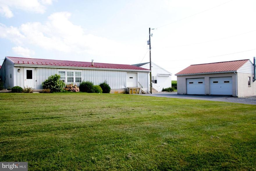 4200 SF building with 2400 SF office space & 1800 SF warehouse over the years, Nolts Office Furniture. Getz Fire Protection & Beams Music have operated on this property. Property also offers a large 2 1/2 story house with an attached 2 car garage 16x32 work shop and a detached block 2 car garage all along busy Rothsville Road! Short sale.